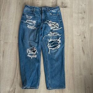 Distressed Blue Denim Jeans